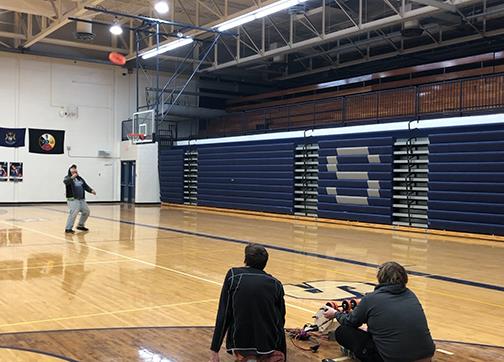 Students shooting a ring or \