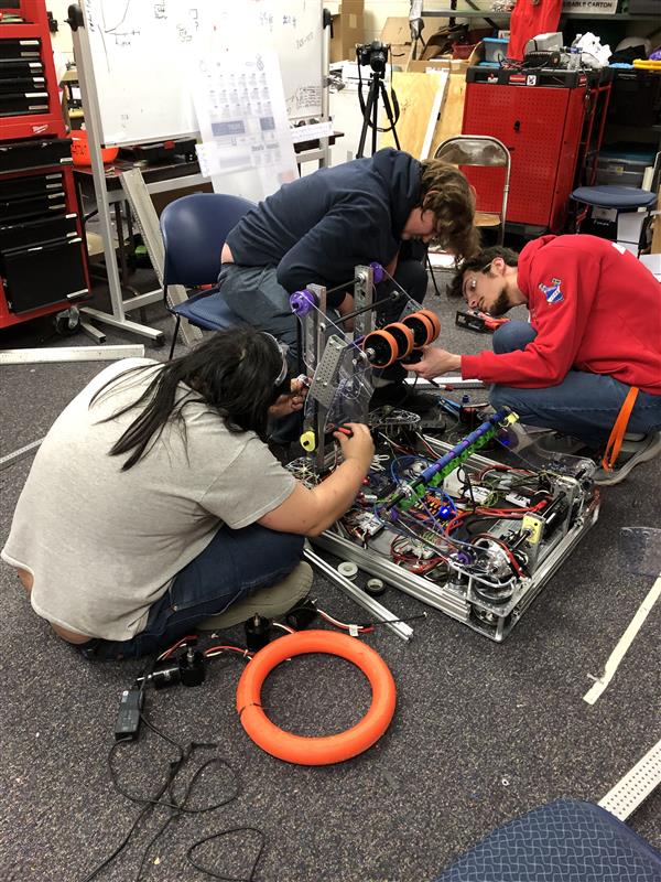 Students working on the robot.